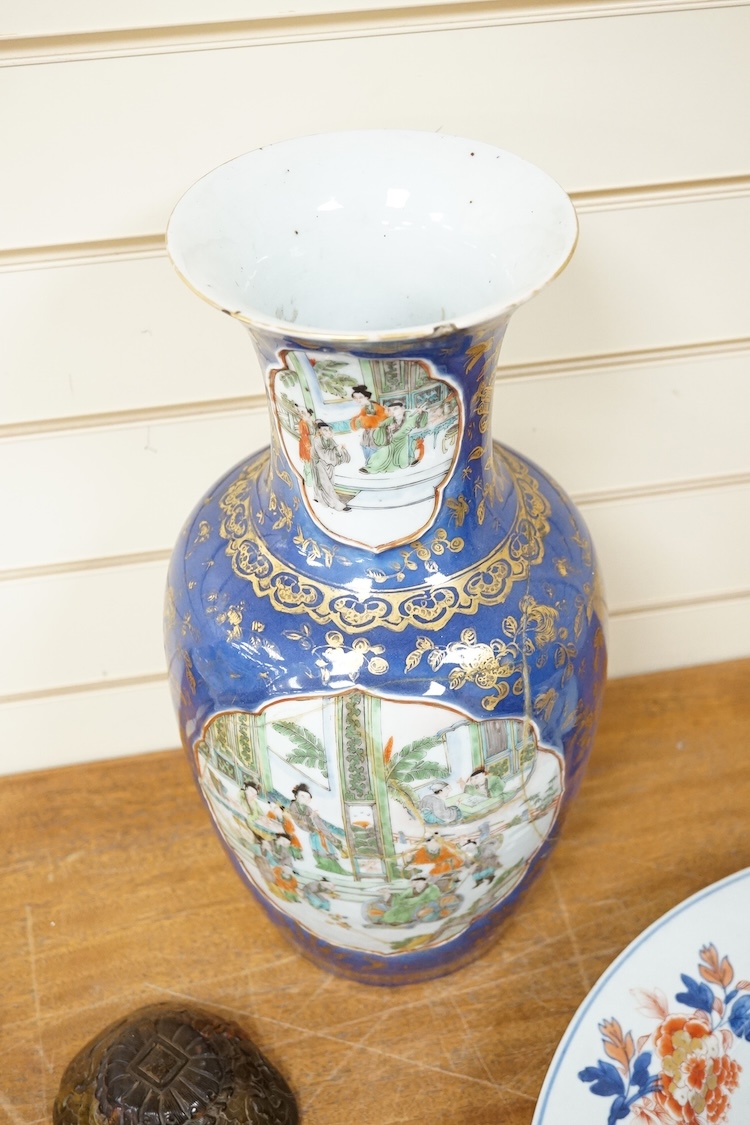 Three early 18th century Chinese Imari dishes (one clobbered), largest 46.5cm, together with a 19th century Chinese powder blue ground vase, 44cm high and a horn carving, 13.7cm (5)